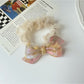 Gifty scrunchie packaging showing brand name and product inside