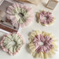 Gifty Sweet Color Block Tulle Scrunchie in pastel pink and blue on white background