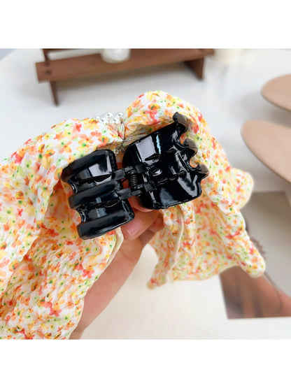 Back view of Beau Polka Dot Bow Claw Clip with polka dot pattern