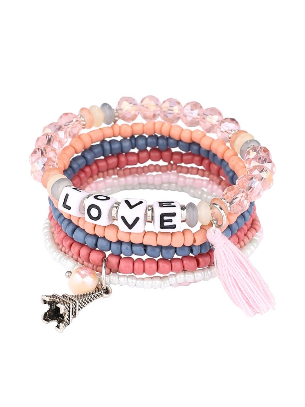 Lovra bracelet with tassel charm laid flat showing bead texture and color variety