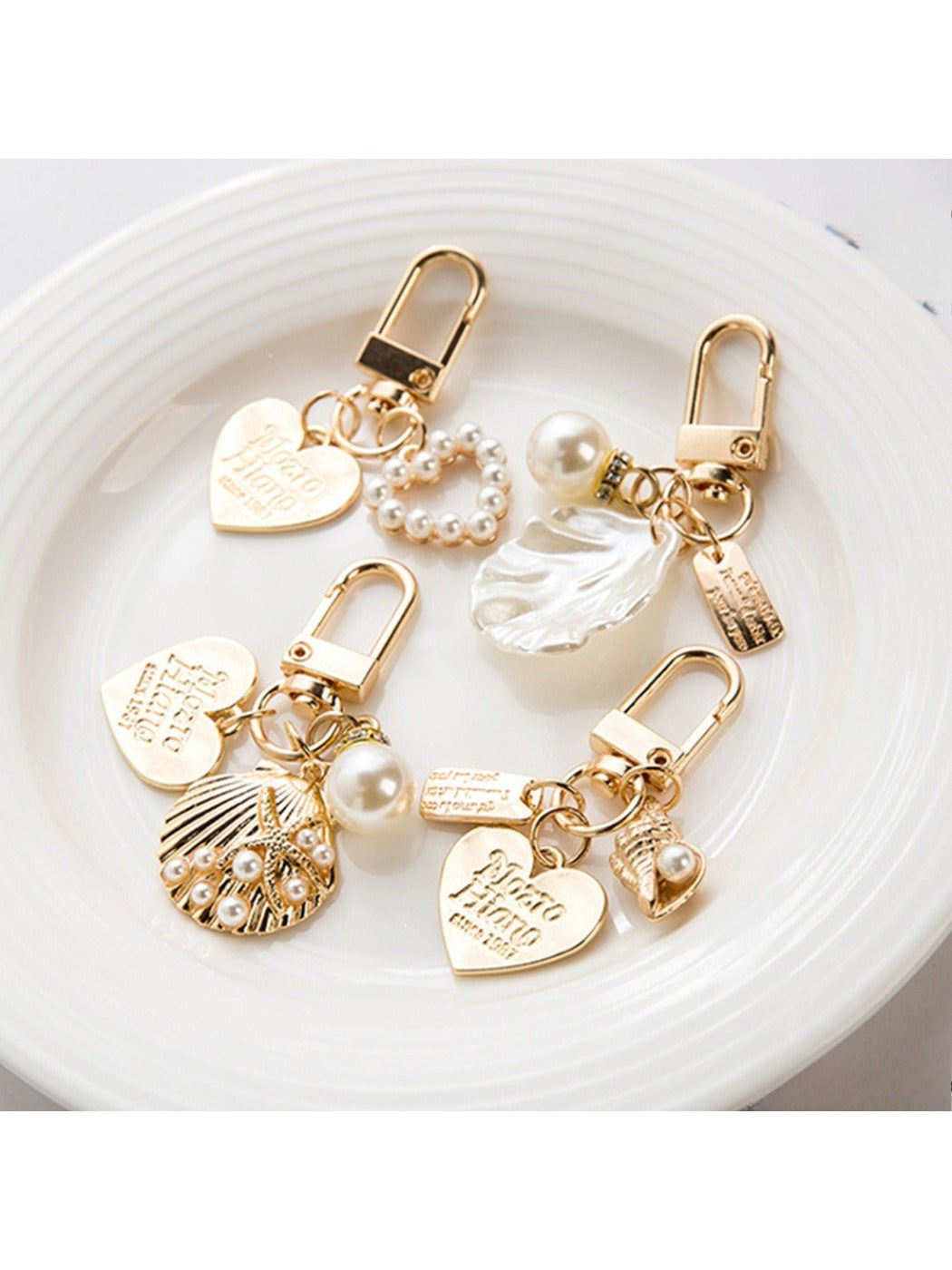 Close-up of a shiny alloy heart keychain with a smooth finish