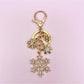 Silver snowflake keychain pendant with detailed symmetrical design