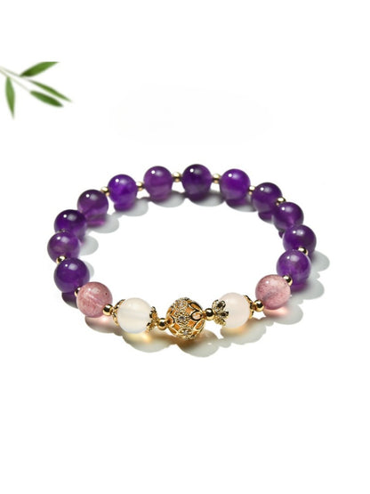 Lovra vintage purple beaded bracelet displayed on a white background