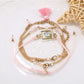 Lovra tassel pendant small bead bracelet shown with matching jewelry pieces