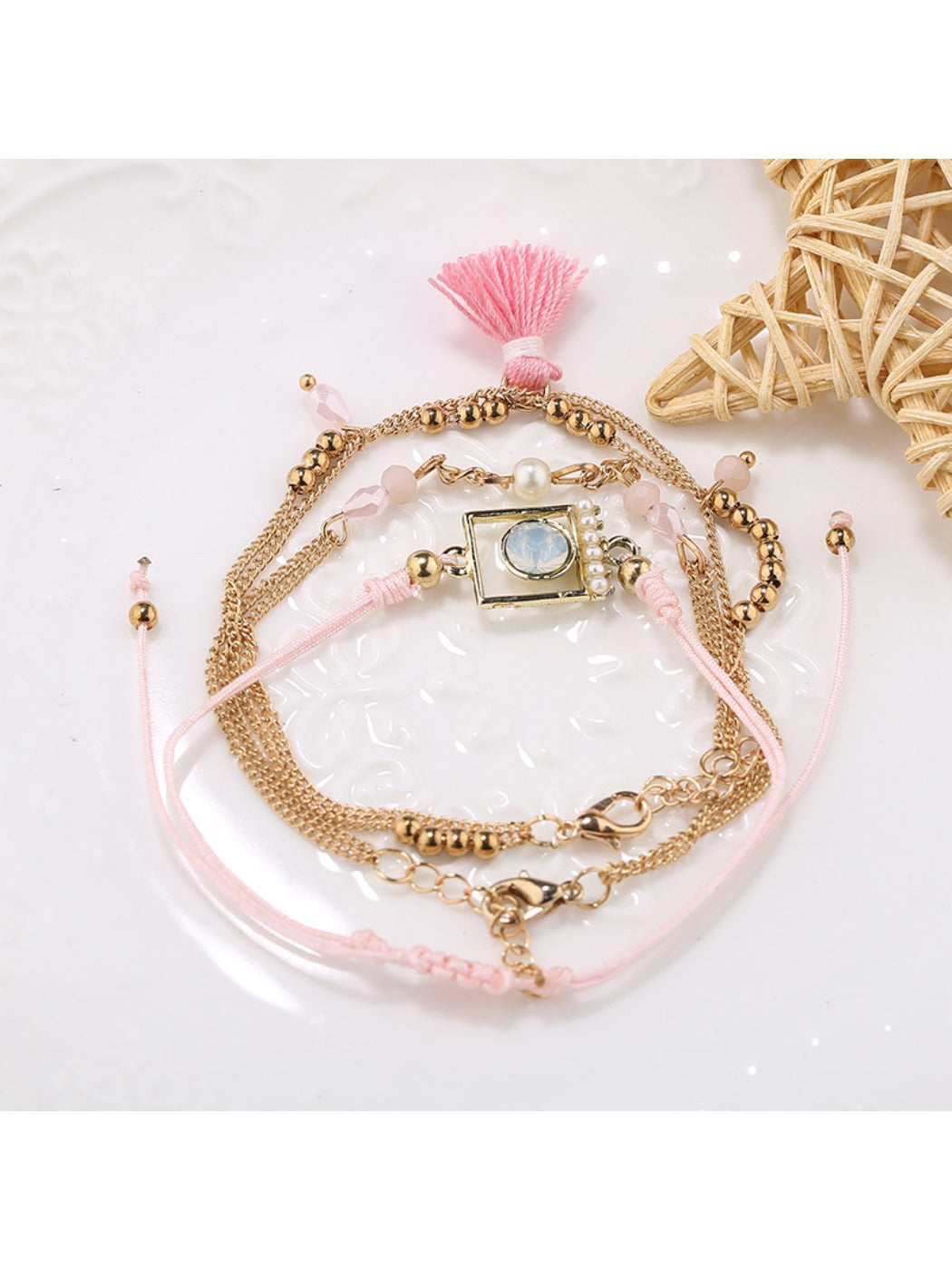 Lovra tassel pendant small bead bracelet shown with matching jewelry pieces