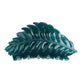 Beau leaf shaped hair clip photographed with shadow effect