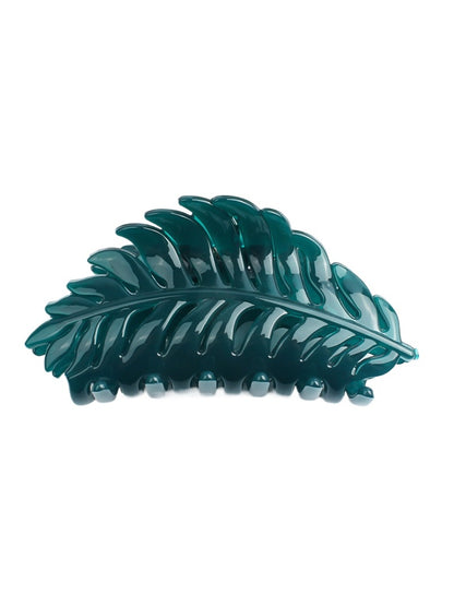 Beau leaf shaped hair clip photographed with shadow effect