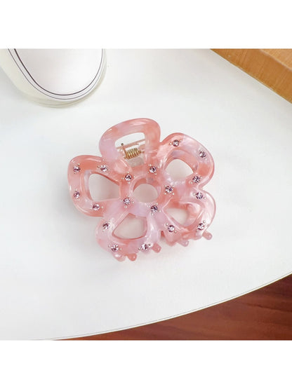Top view of Beau flower shaped hair claw clip showing symmetrical design