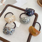 Gifty - Elegant Oval Shaped Hair Tie