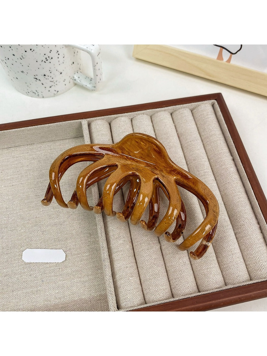 Beau textured shark hair claw clip angled to show both sides and teeth