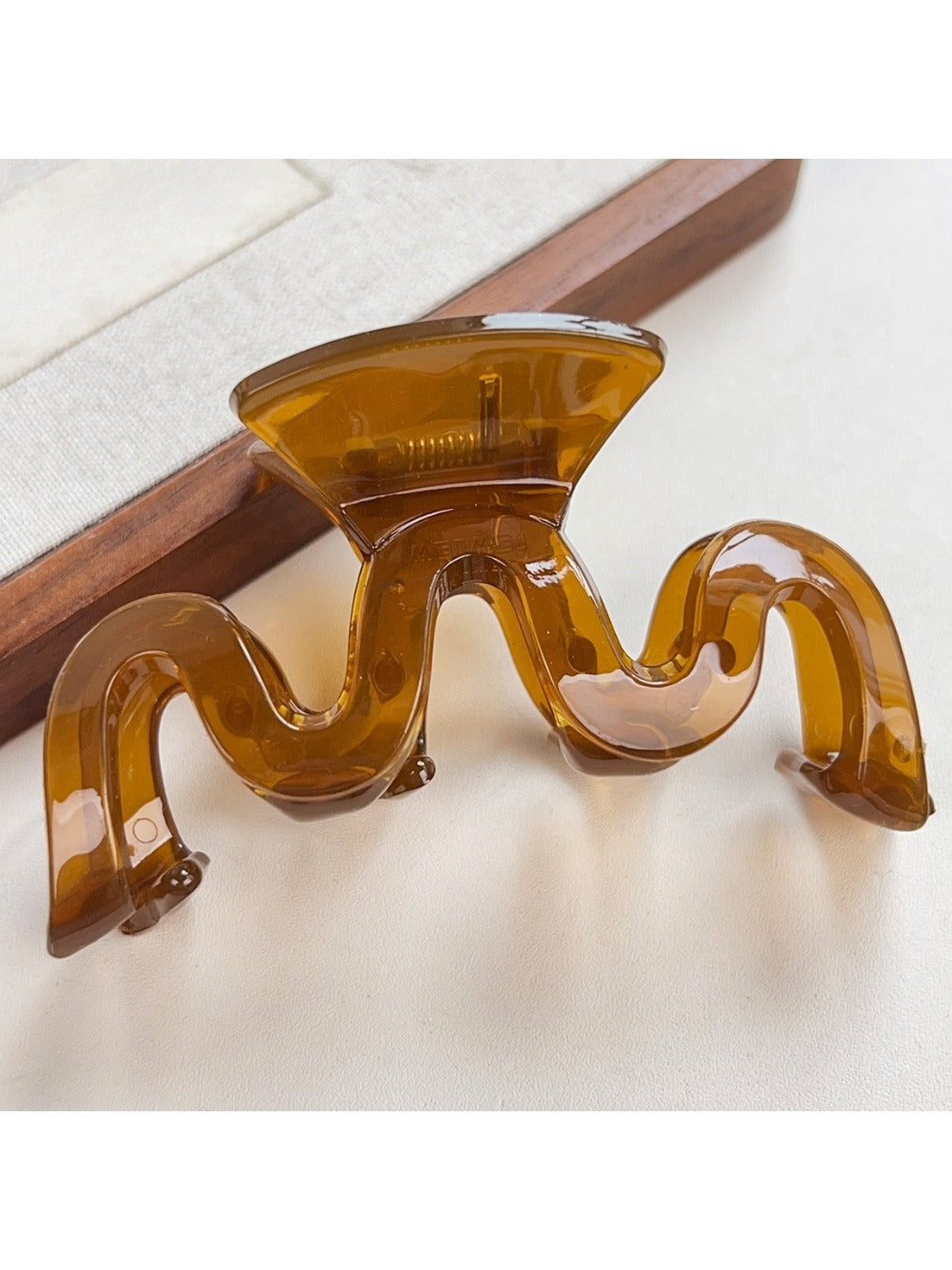 Beau hair claw clip in close-up showing hinge and clasp details