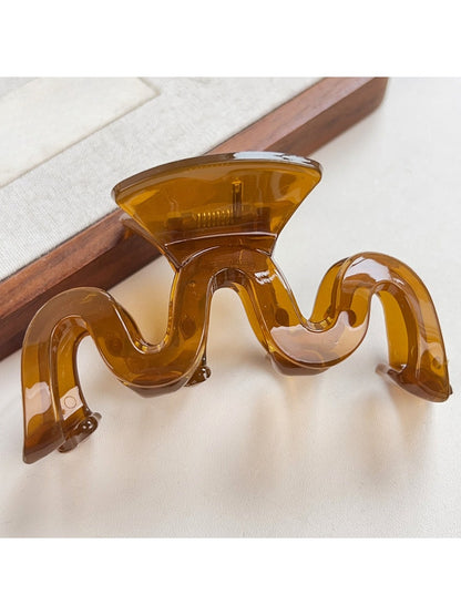Beau hair claw clip in close-up showing hinge and clasp details