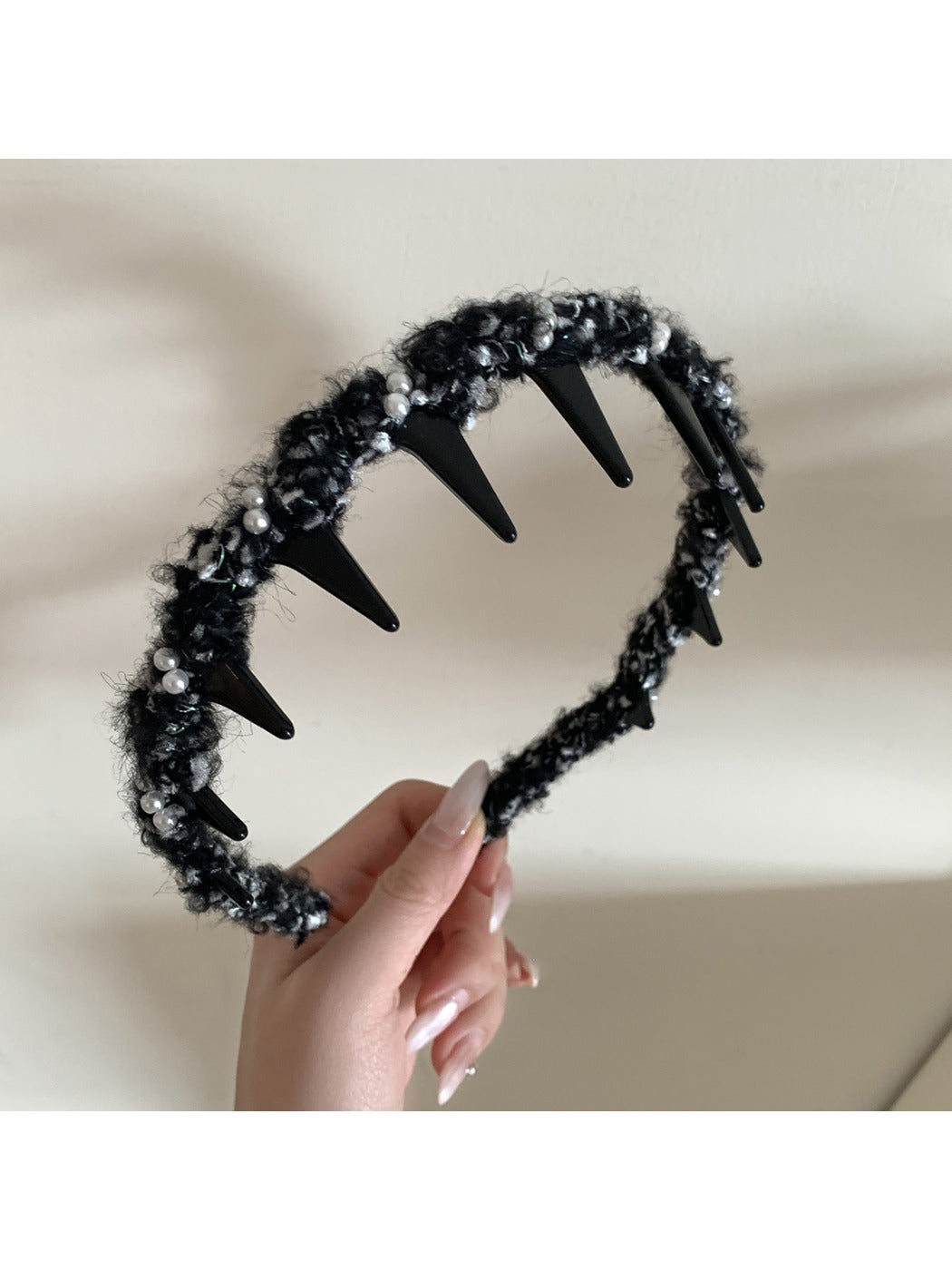 Side view of Gifty fluffy headband highlighting thickness and softness