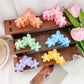 Close-up of Beau Sweet Three Flower Hair Claw Clip with detailed flower design
