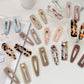 Beau - Glossy Teardrop Shaped Openwork Hair Clip