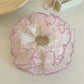 Gifty colorful polka dot tulle scrunchie on white background