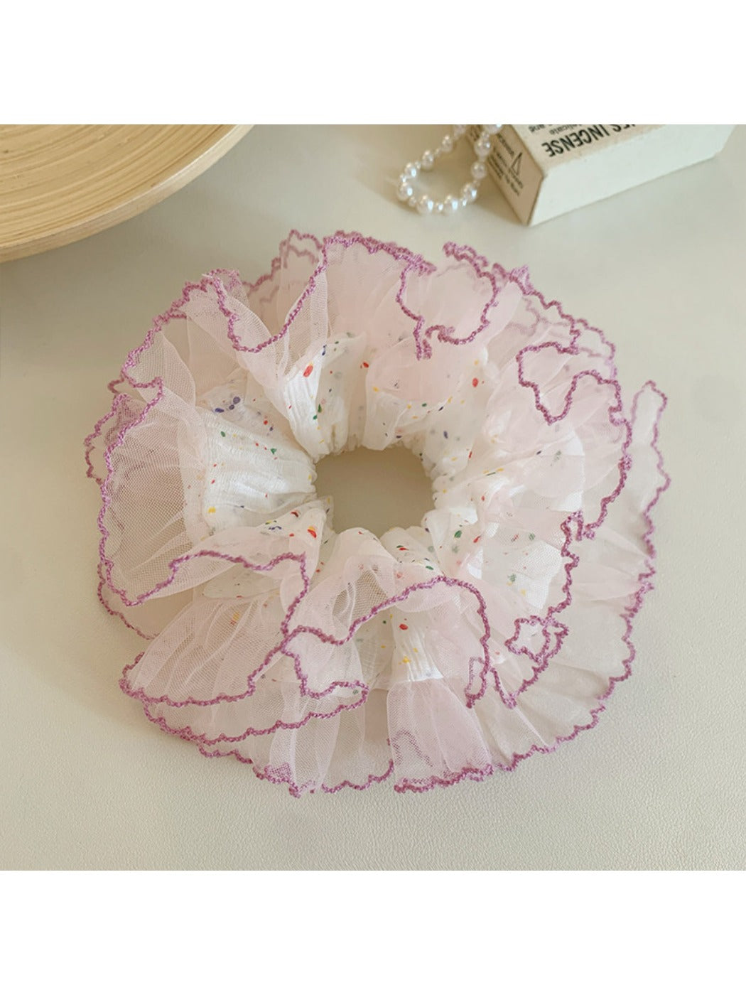 Gifty colorful polka dot tulle scrunchie on white background