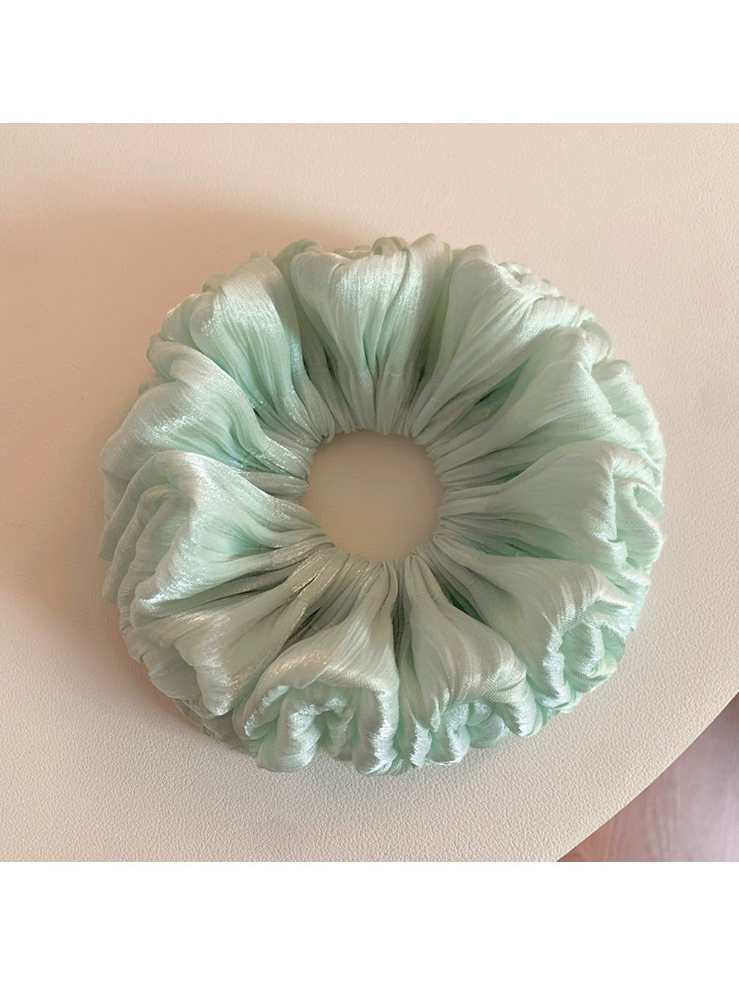 Sweet green double layered scrunchie with soft fabric texture
