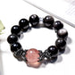 Lovra black crystal beaded bracelet displayed on a wooden surface