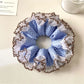 Close-up of Gifty double layer polka dot scrunchie showing fabric texture