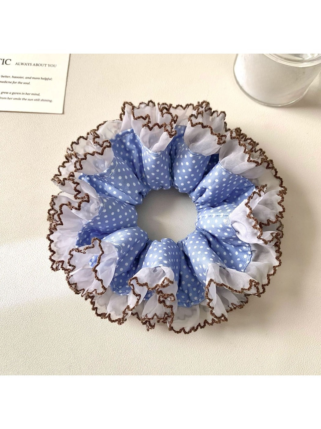 Close-up of Gifty double layer polka dot scrunchie showing fabric texture