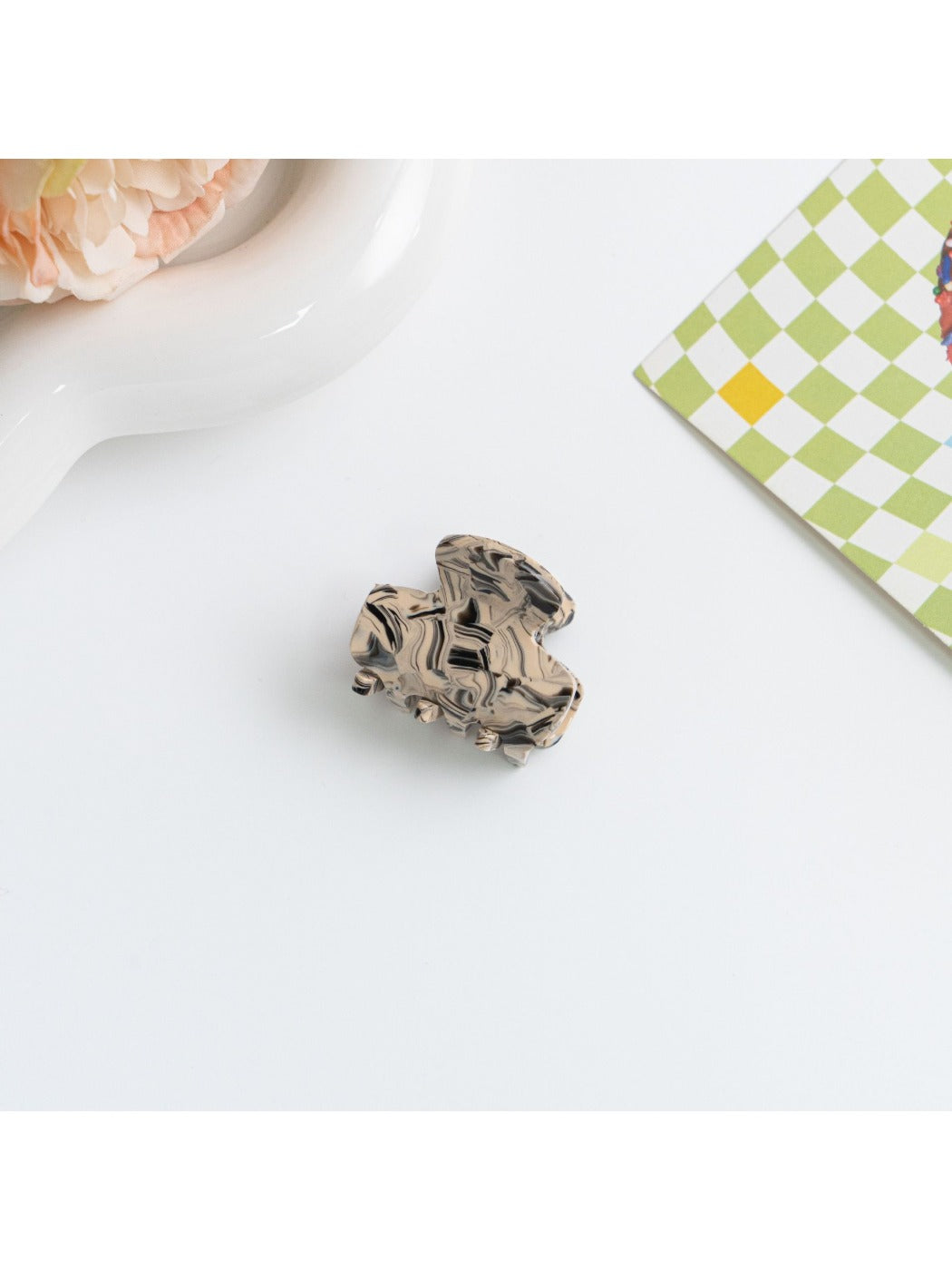 Beau hair clip with clasp open to display fastening details