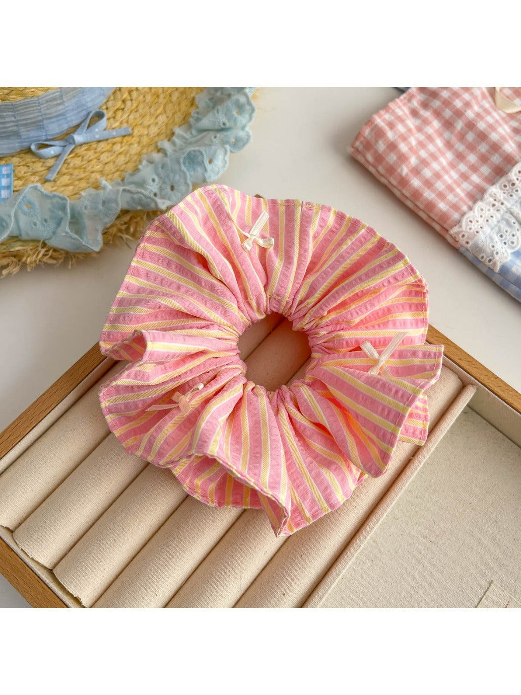 Top view of Gifty scrunchie highlighting multicolor stripe pattern