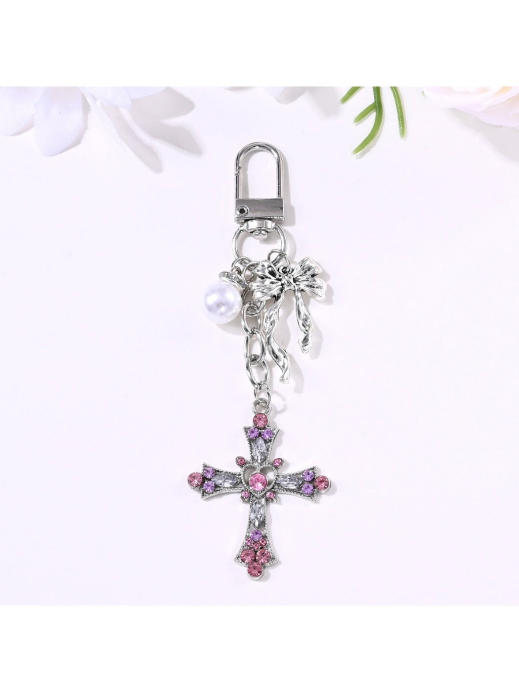Top view of the keychain ring connected to the heart bow charm