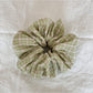Gifty Sweet Green Style Scrunchie laid flat to show full circular shape and fabric pattern