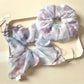 Close-up of Gifty stylish minimalist ombre scrunchie in soft pastel colors