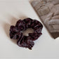 Pack of multiple Gifty artistic printed scrunchies arranged to show variety of prints
