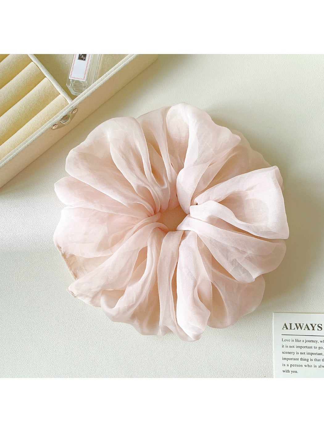 Gifty Pure Simple Mesh Scrunchie stretched to show elasticity