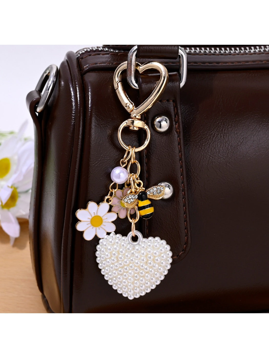Rhinestone heart keychain displayed on a flat surface highlighting shine and texture