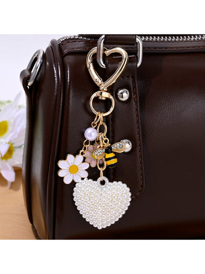 Rhinestone heart keychain displayed on a flat surface highlighting shine and texture