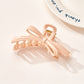 Beau - Curved Plastic Bow Hair Styling Claw Clip