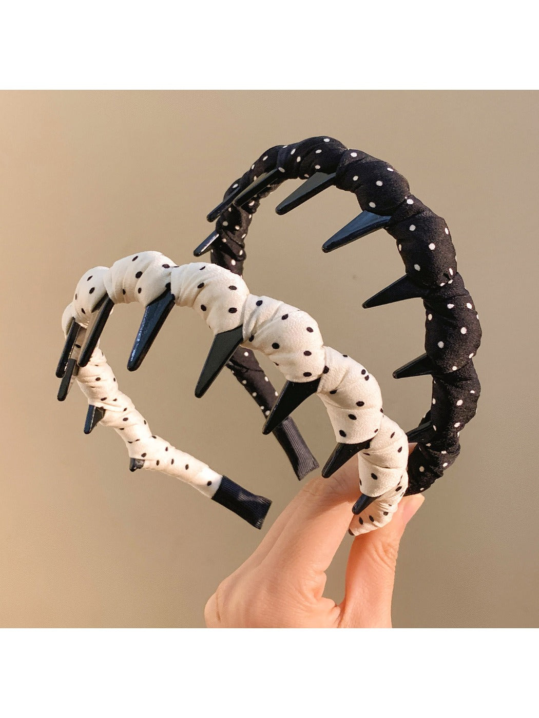 Model wearing Gifty polka dot headband with casual outfit