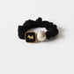 Gifty modern round bead hair tie displayed with matching accessories