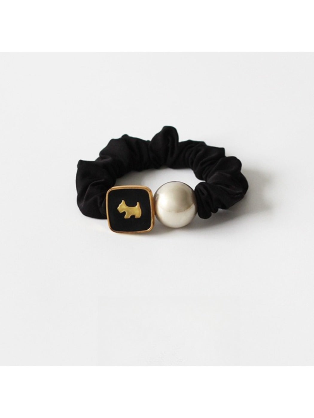 Gifty modern round bead hair tie displayed with matching accessories