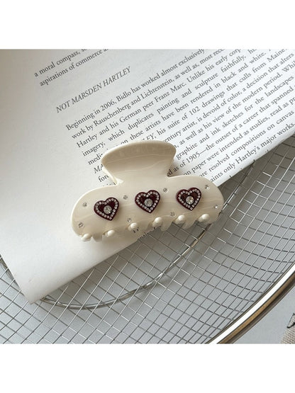 Beau Sweet Heart Shaped Acetate Hair Clip worn in styled hair, highlighting size and shape