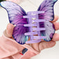 Beau butterfly hair claw clip open, displaying teeth and grip design