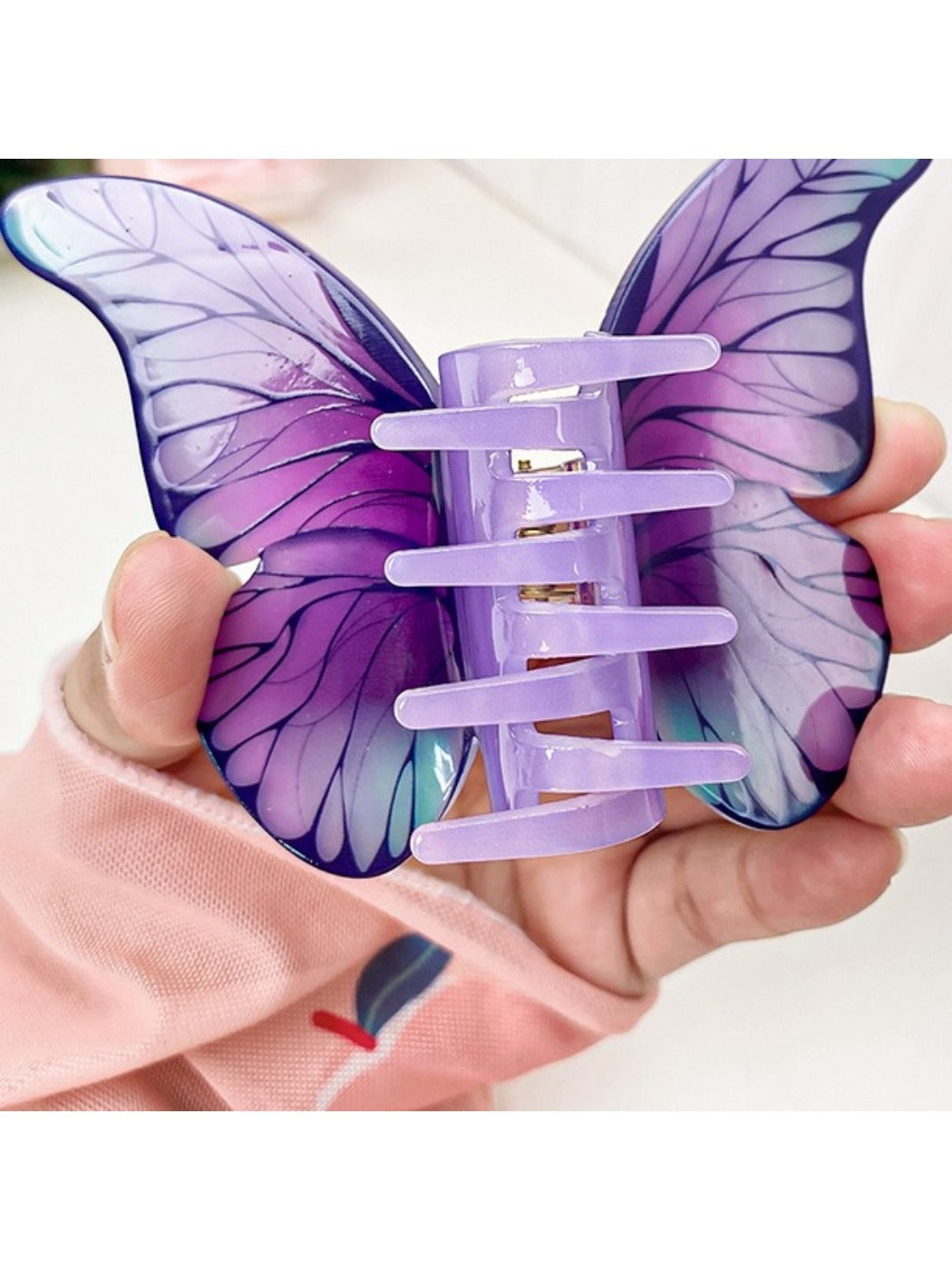 Beau butterfly hair claw clip open, displaying teeth and grip design