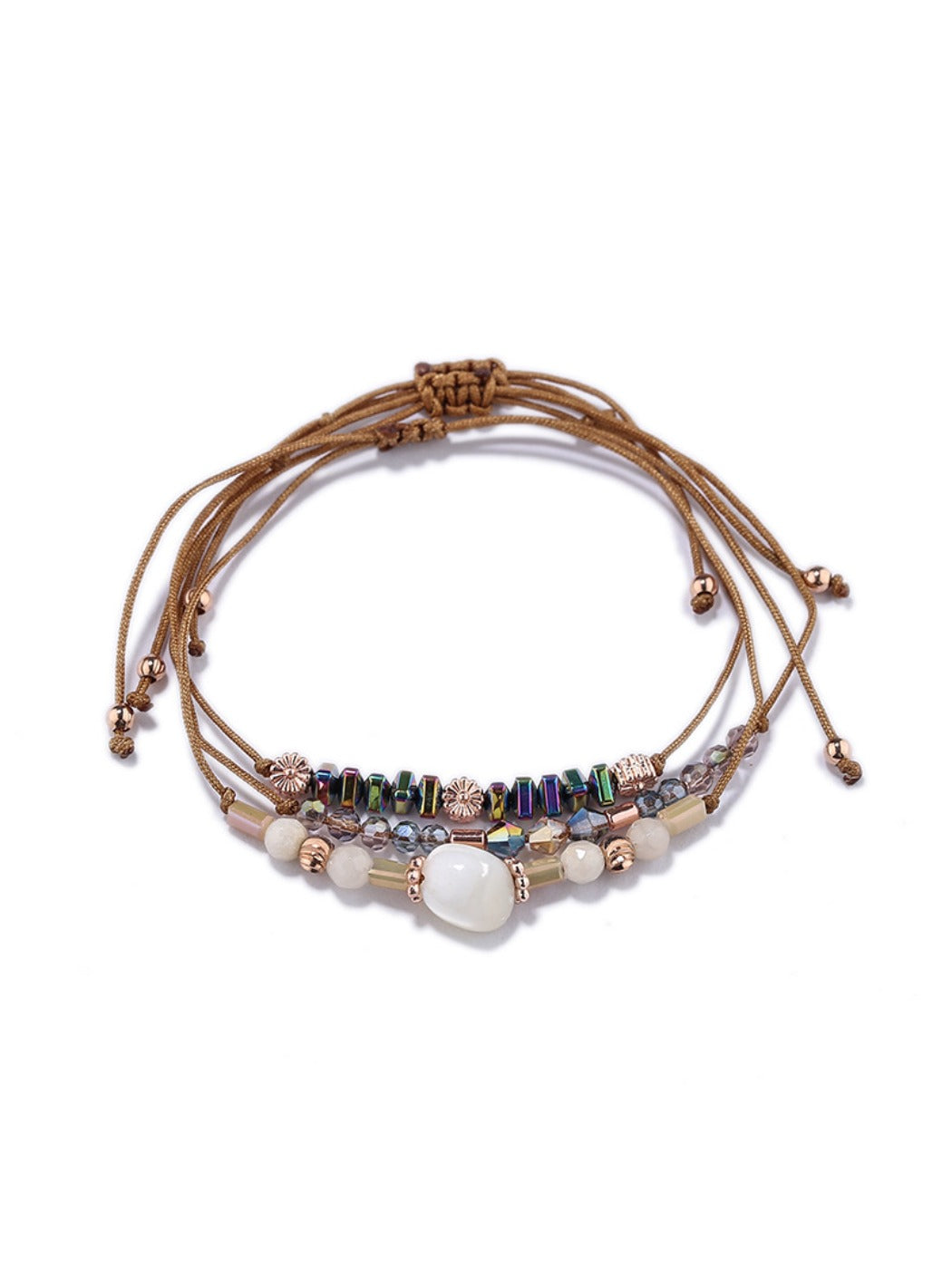 Lovra bracelet with beads and woven cord laid out on white background