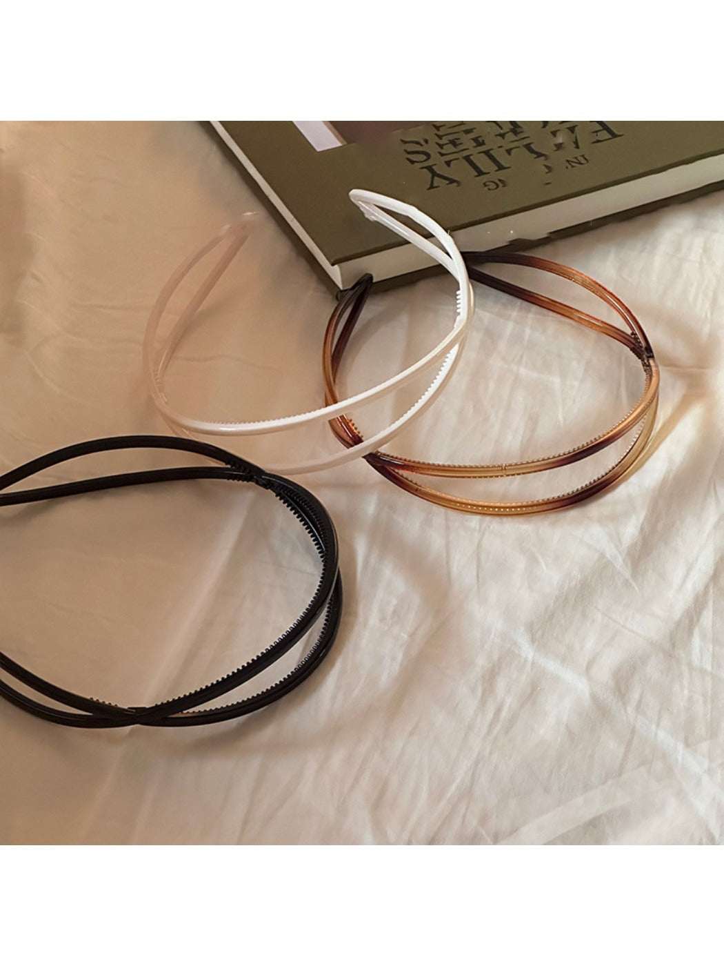 Gifty minimalist irregular acrylic headband in translucent beige on white background