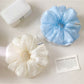 Gifty scrunchie worn on wrist as a fashion accessory