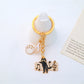 Close-up of piano keys on cartoon cat keychain with glossy finish