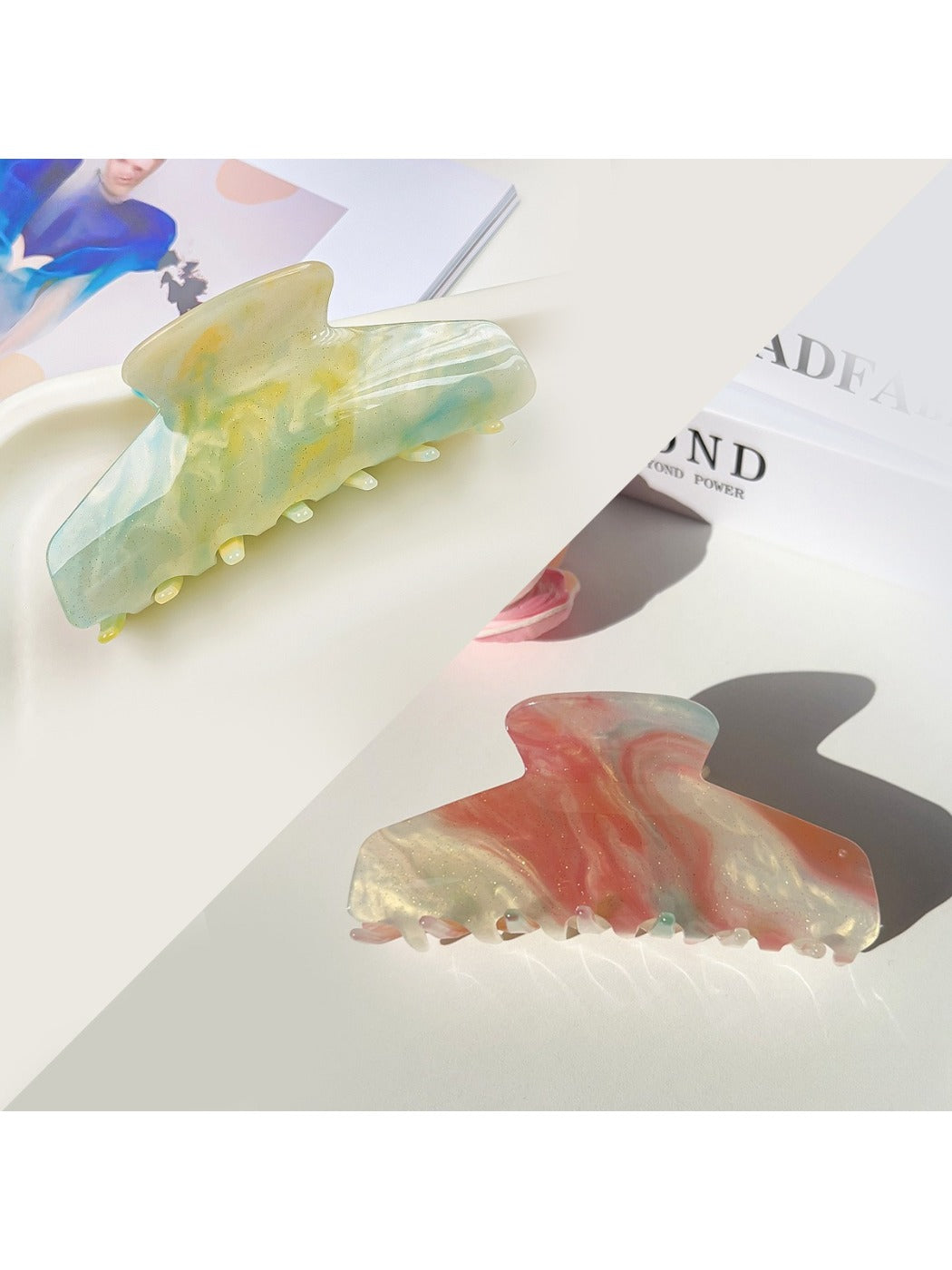 Beau gradient half moon hair claw clip held in hand showing size and shape