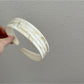 Gifty vintage wide headband styled with loose hair on female model