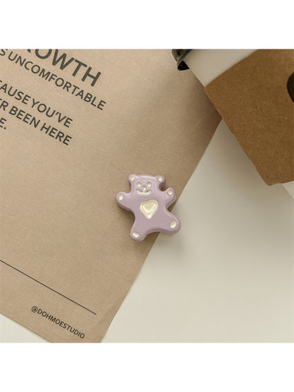 Minimalist rose hair tie and clip set shown with natural lighting