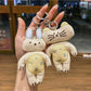 Keypus keychain featuring both kitty and bunny charms hanging from a silver ring
