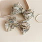 Beau Bow Tiny Floral Snap Hair Clip displayed on a white background